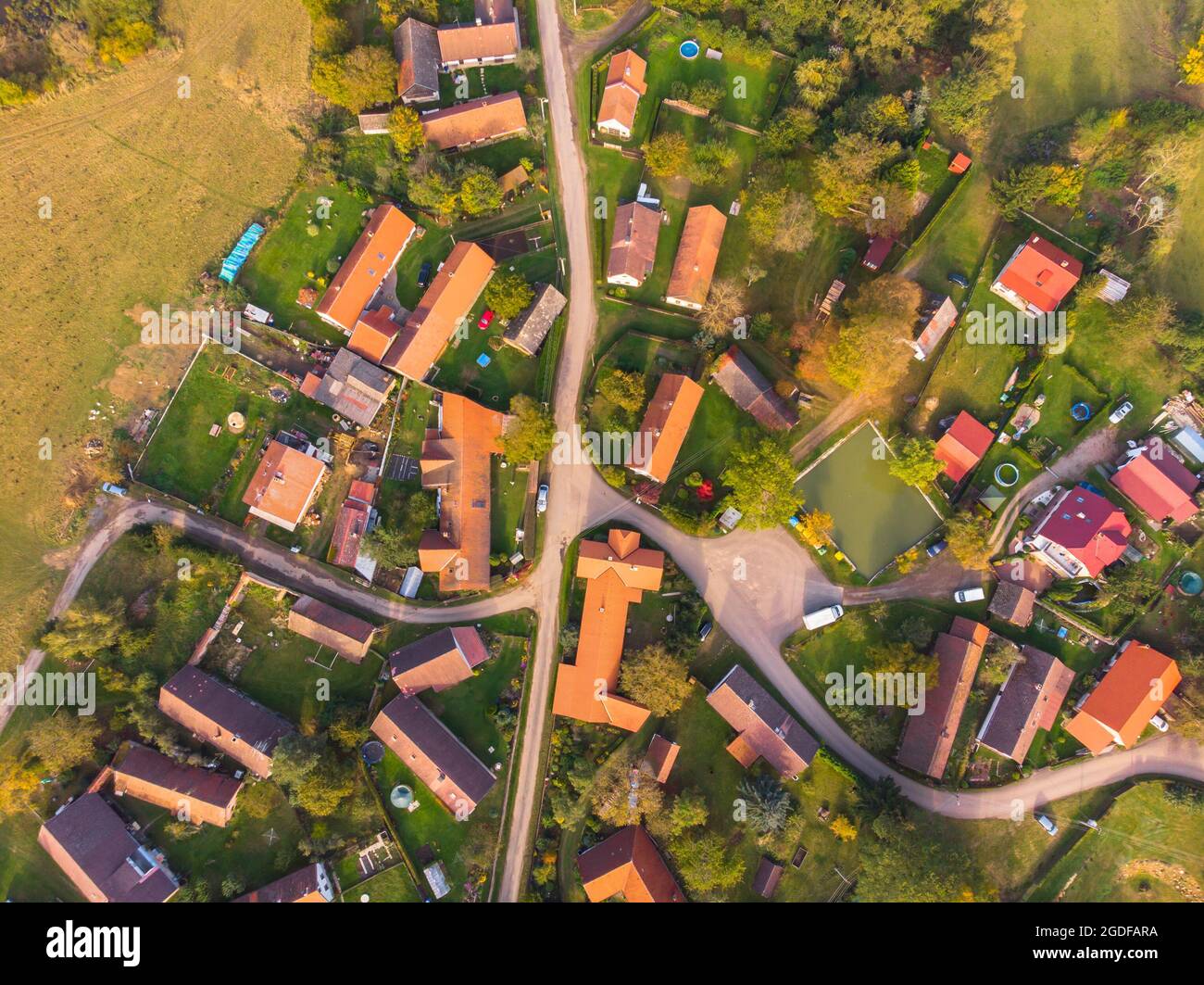 Aerial view of a small village.Top view of traditional housing estate in Czech. Looking straight down with a satellite image style.Houses from above Stock Photo