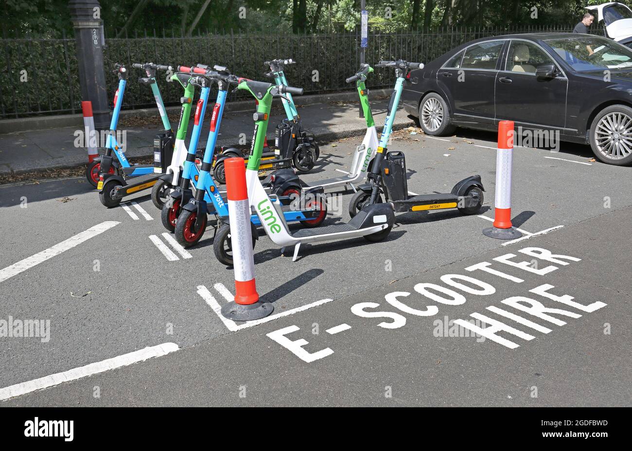 E-scooter hire point in Belgrave Square, Chelsea, London, UK. Stock Photo