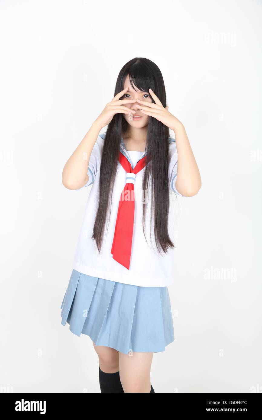 asian school girl isolated in white background Stock Photo