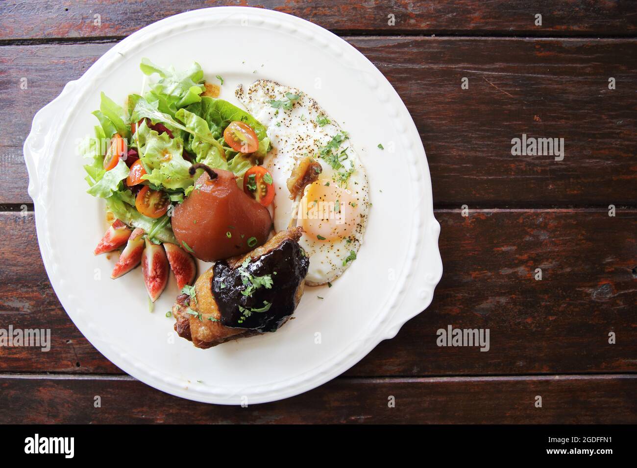 Duck confit , Roasted duck leg Stock Photo - Alamy