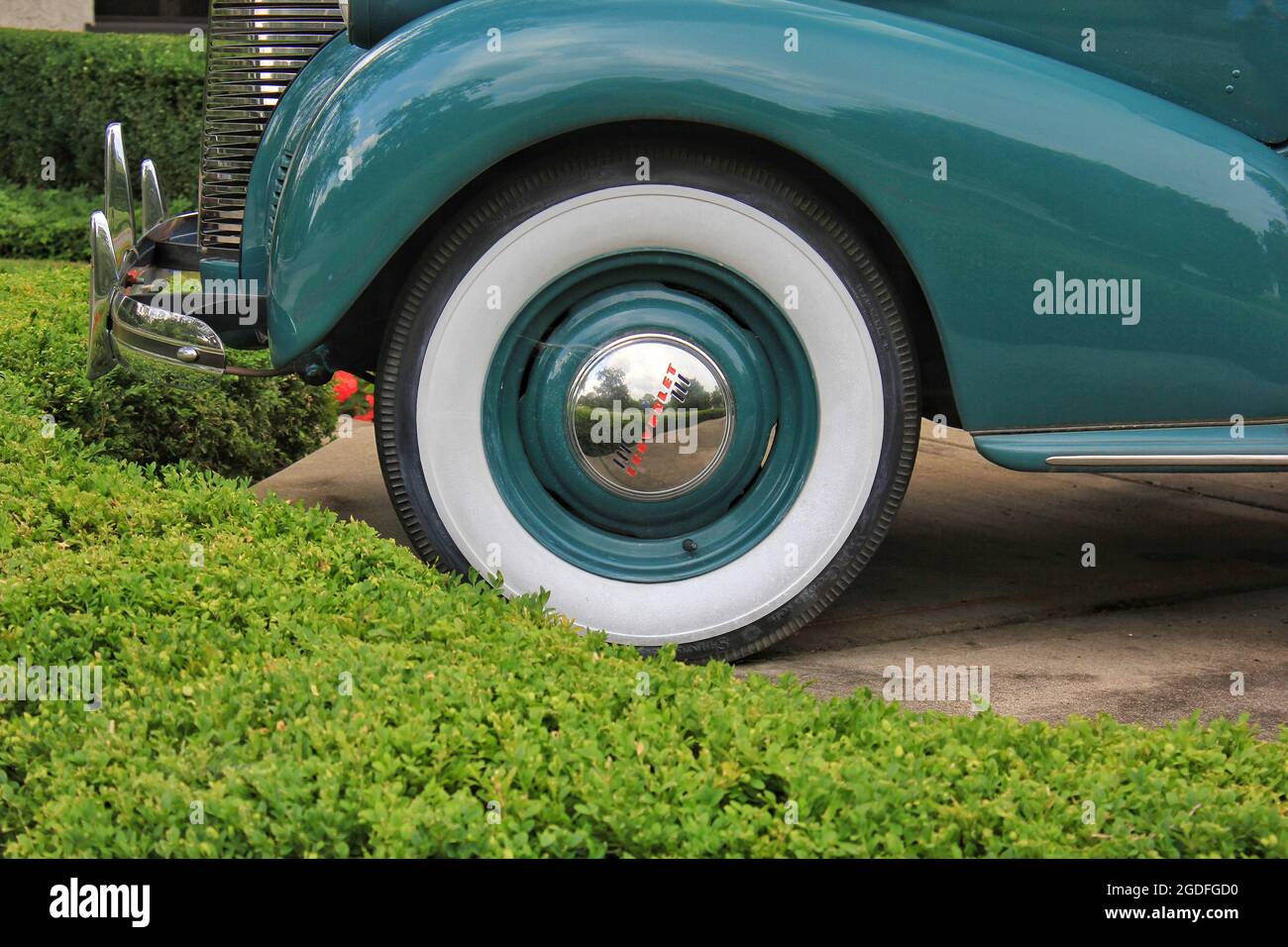 Green vintage antique 1940s Chevy Deluxe Cabriolet car in mint