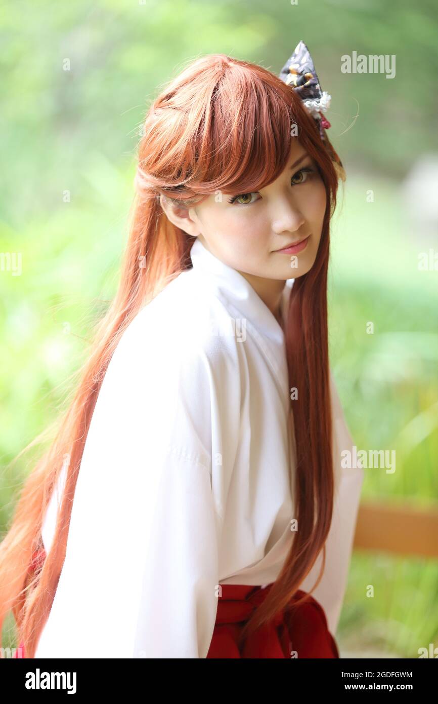 Asian girl portrait , Japanese Miko in nature Stock Photo