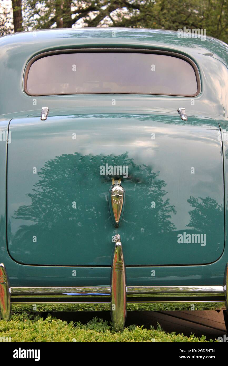 Green vintage antique 1940s Chevy Deluxe Cabriolet car in mint