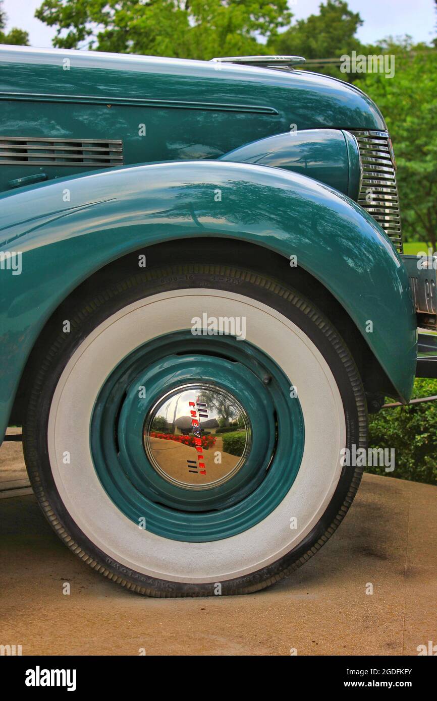 Green vintage antique 1940s Chevy Deluxe Cabriolet car in mint