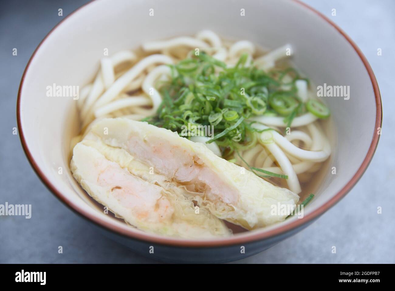 Udon noodles with shrimp tempura Stock Photo Alamy