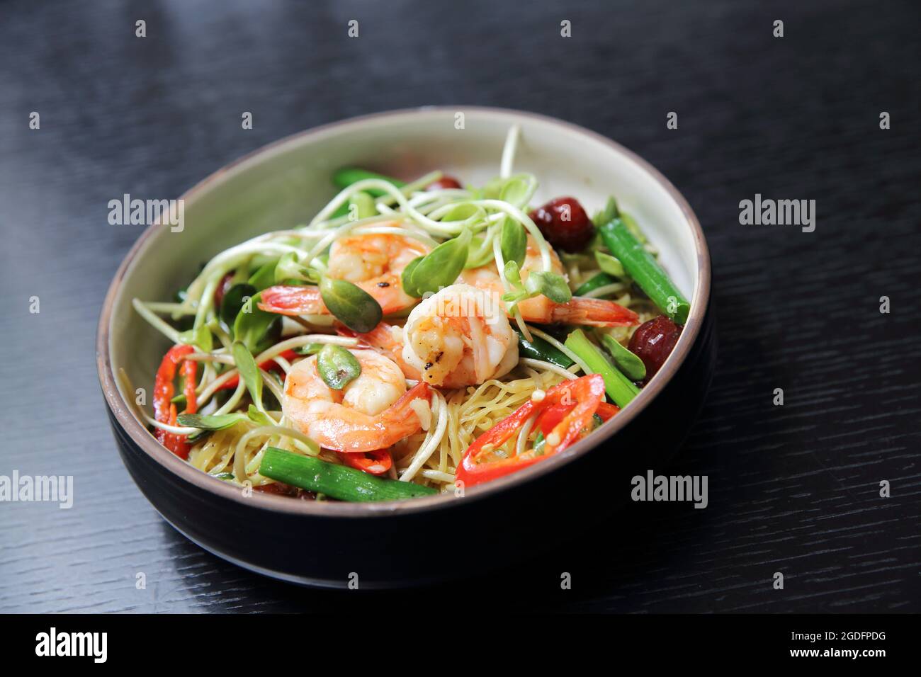 Chinese food shrimp and green vegetable with noodles Stock Photo