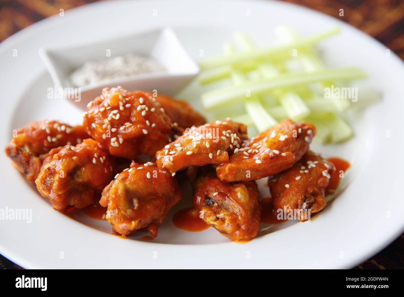 Buffalo wings fried chicken with spicy sauce Stock Photo Alamy