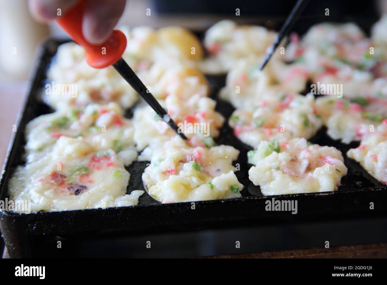 process to cooking takoyaki japanese food Stock Photo
