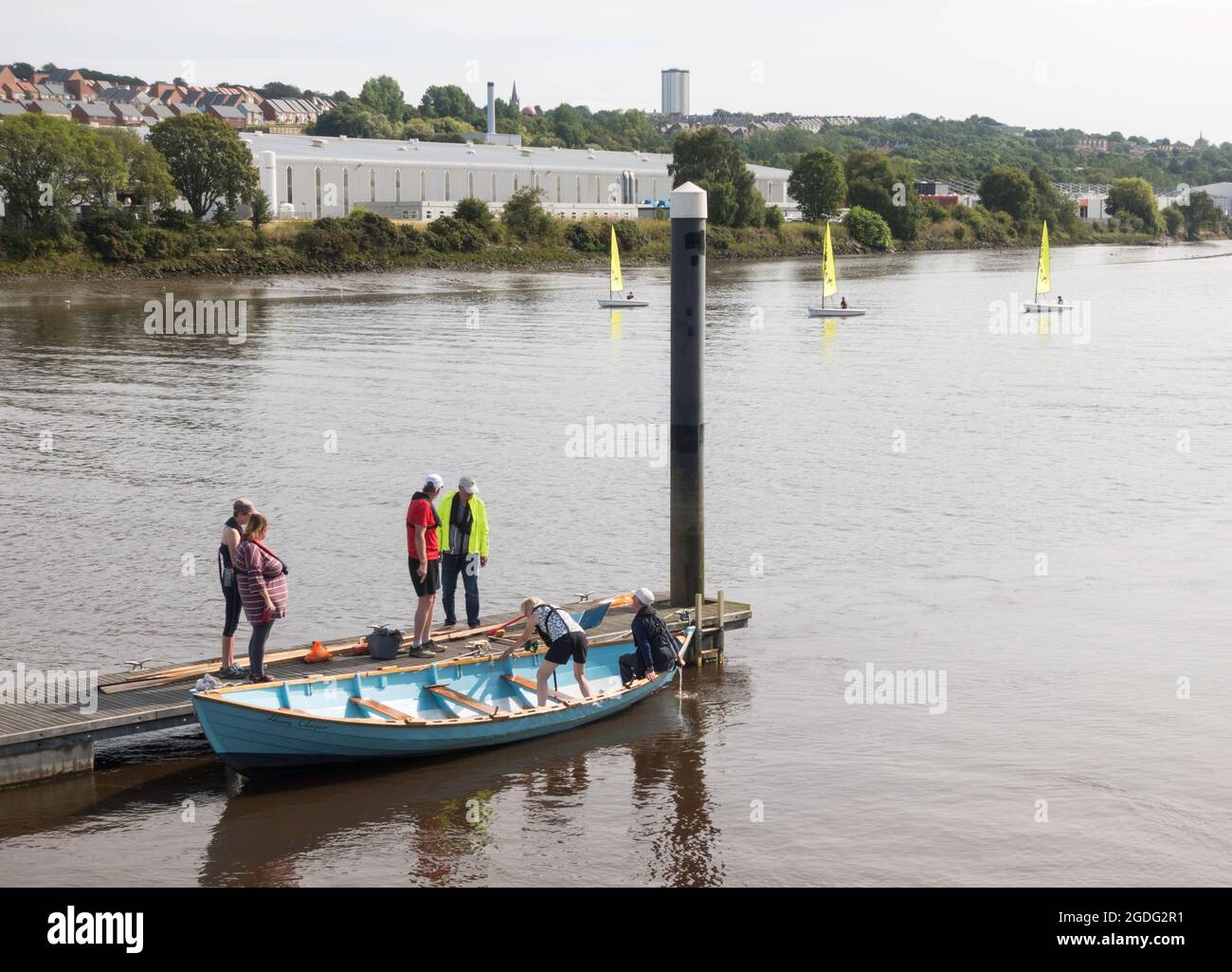 People learning how to sail on the river Tyne at Derwenthaugh Boat Station, near Newcastle, England, UK Stock Photo