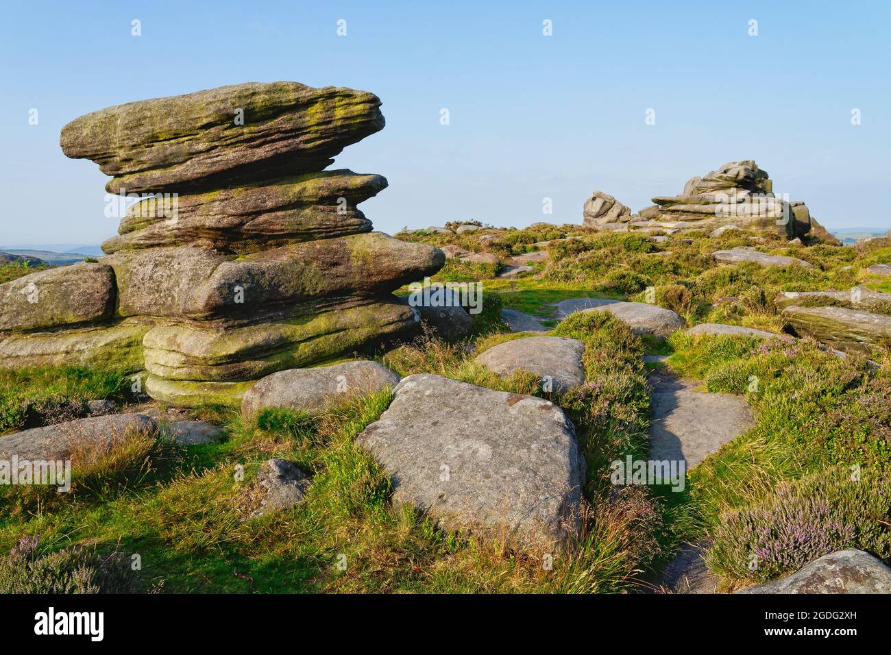 Derbyshire gritstone boulders and outcrops eroded over time in to ...