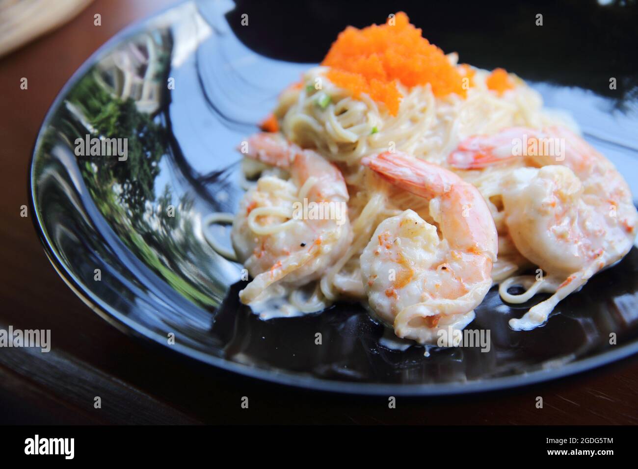 Shrimp spaghetti with white sacue Stock Photo