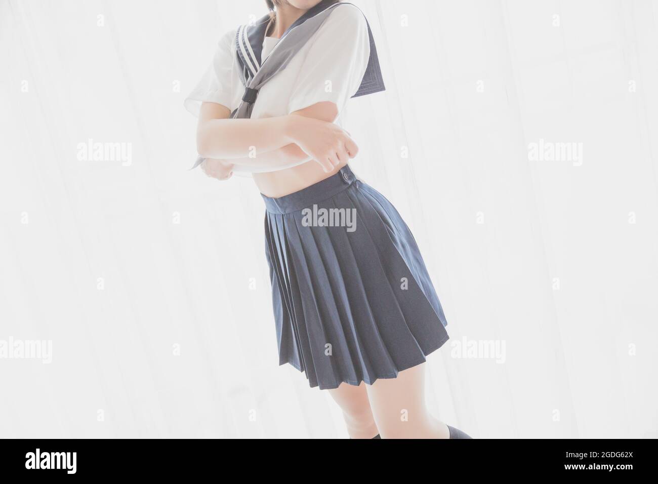 asian japanese girl student in school uniform Take off shirt Stock Photo
