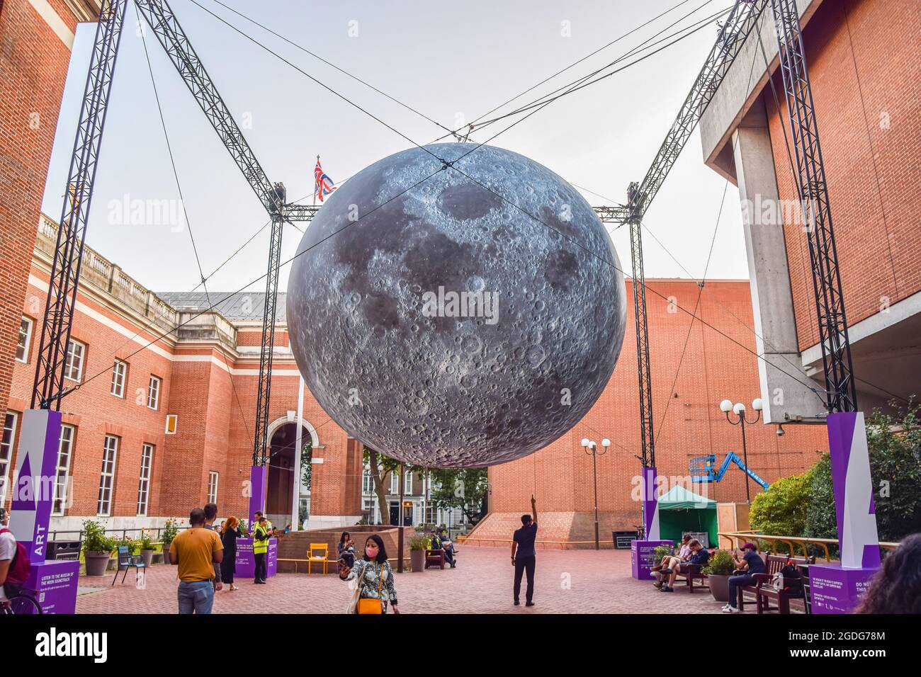 'Museum of the Moon' installation artwork by Luke Jerram at Kensington Town Square. Part of the Kensington + Chelsea Festival, the moon is covered in detailed NASA images of the lunar surface, and measures seven meters in diameter. Stock Photo