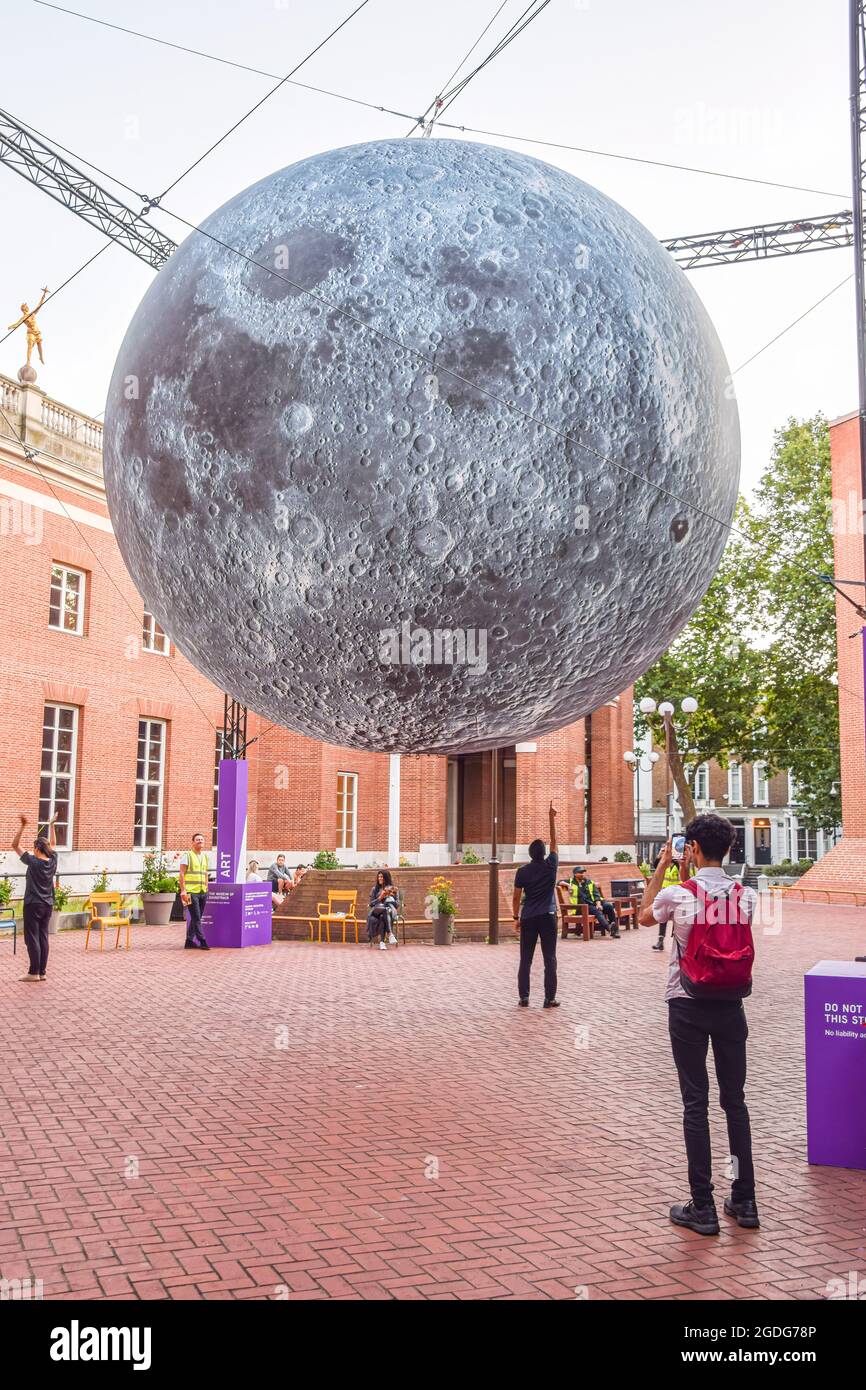 'Museum of the Moon' installation artwork by Luke Jerram at Kensington Town Square. Part of the Kensington + Chelsea Festival, the moon is covered in detailed NASA images of the lunar surface, and measures seven meters in diameter. Stock Photo