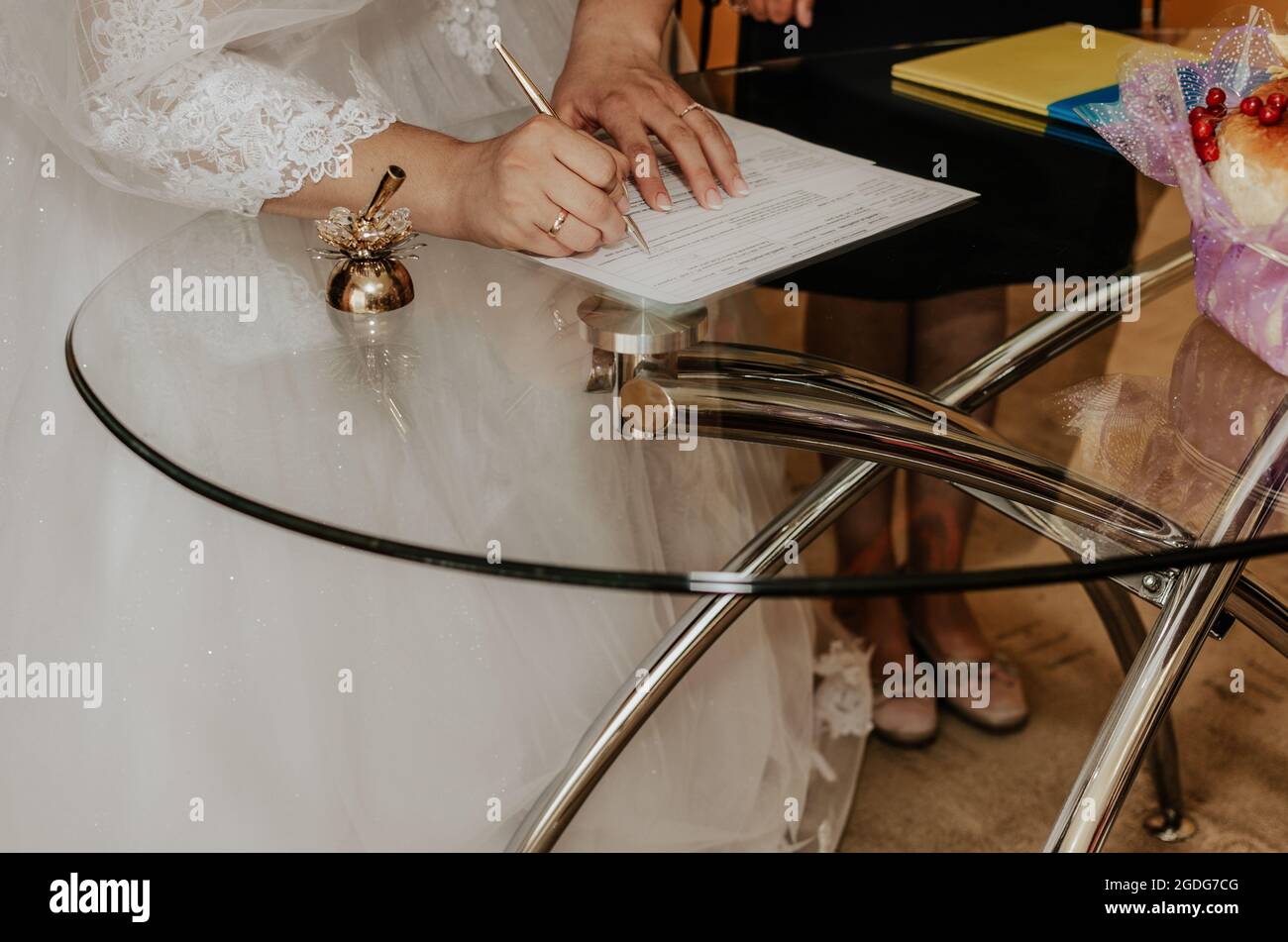 human hand with writing pen.official wedding ceremony in registry