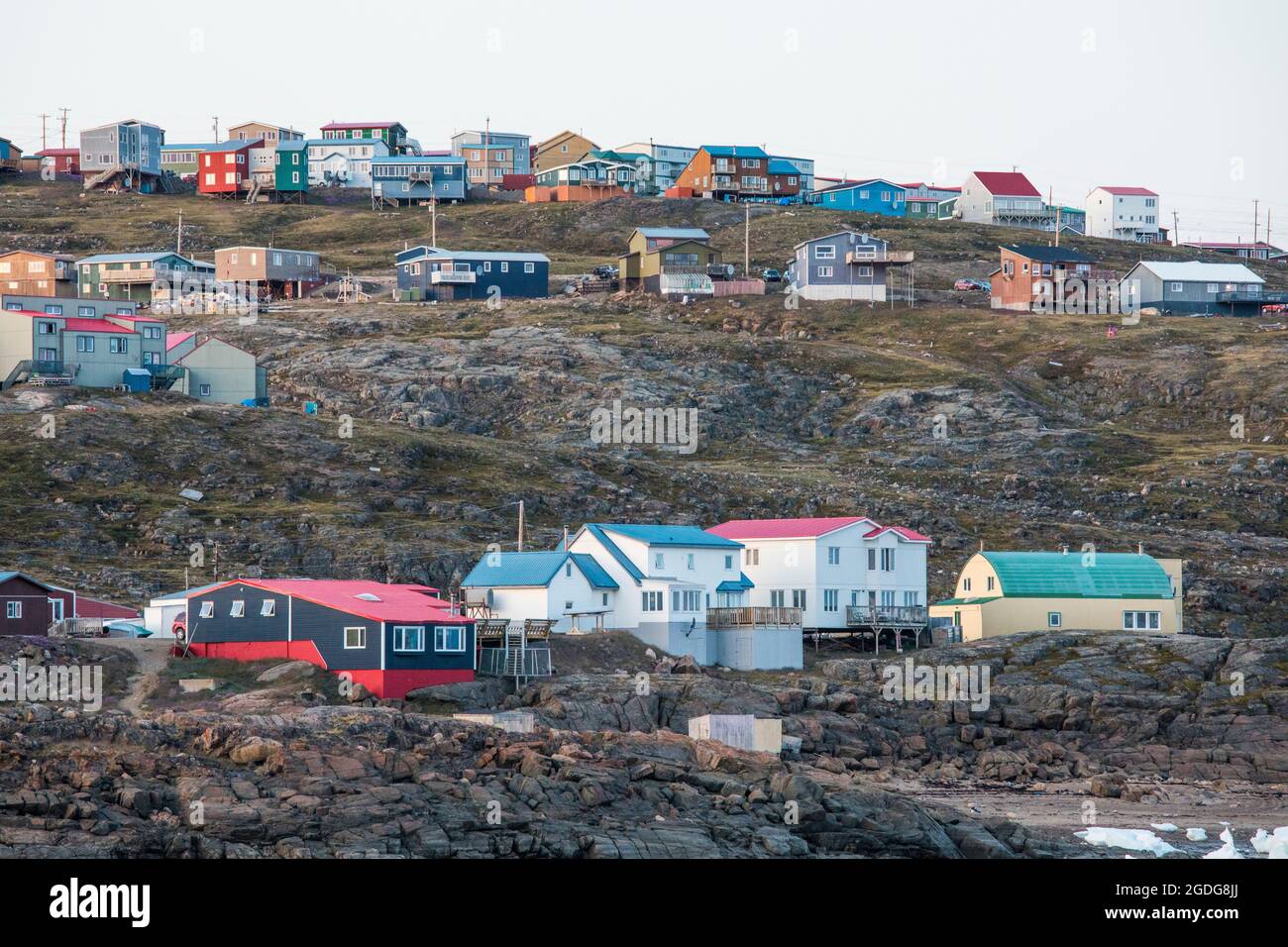 Homes built on seaside cliffs Iqaluit Baffin Island Stock Photo Alamy