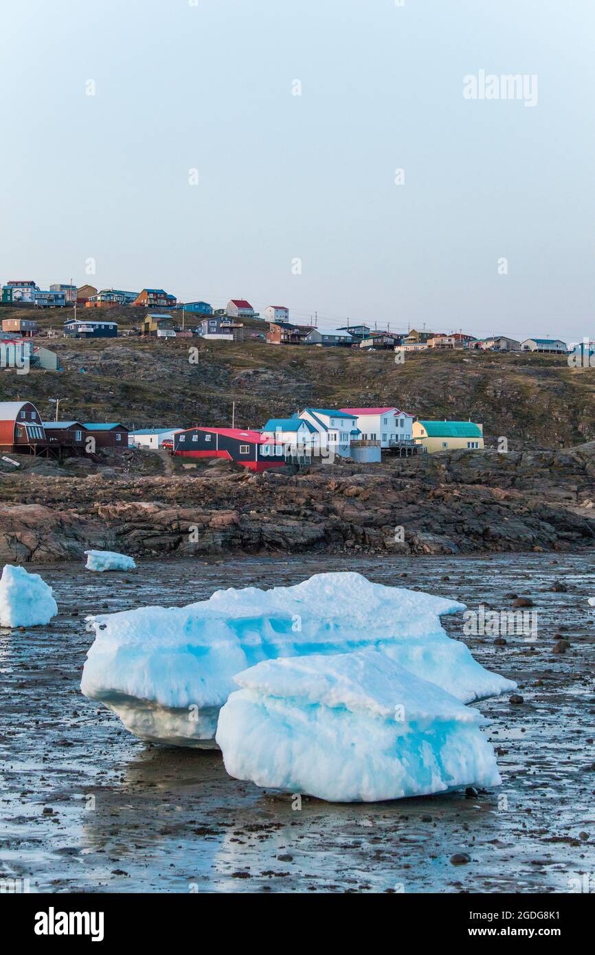 Sea ice in the harbor and the City of, Iqaluit, Canada. Stock Photo