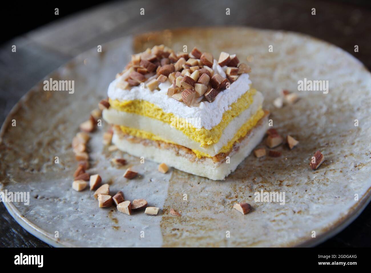 Mango cake with bean on wood background Stock Photo