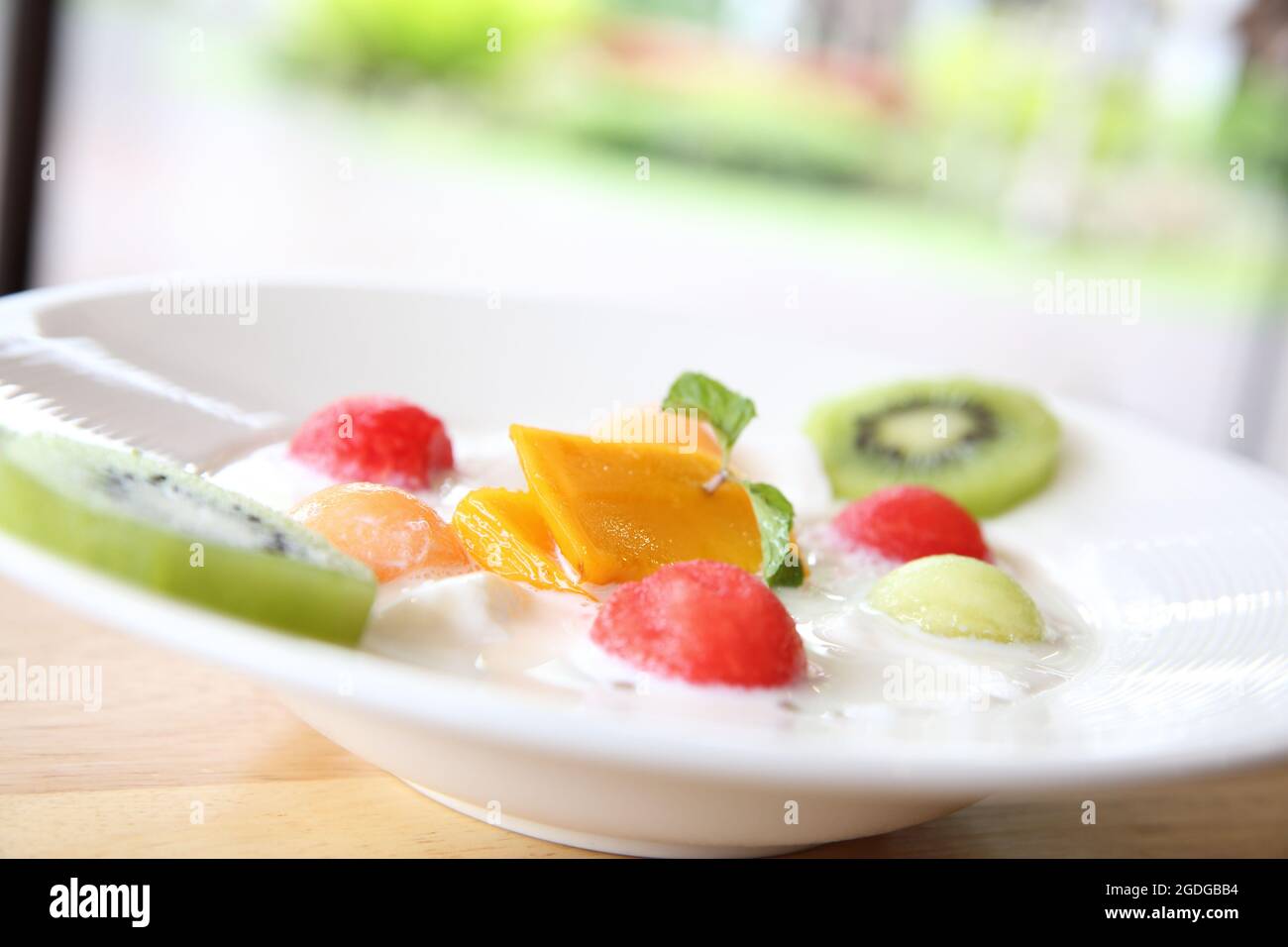 Fruit pudding on wood background Stock Photo