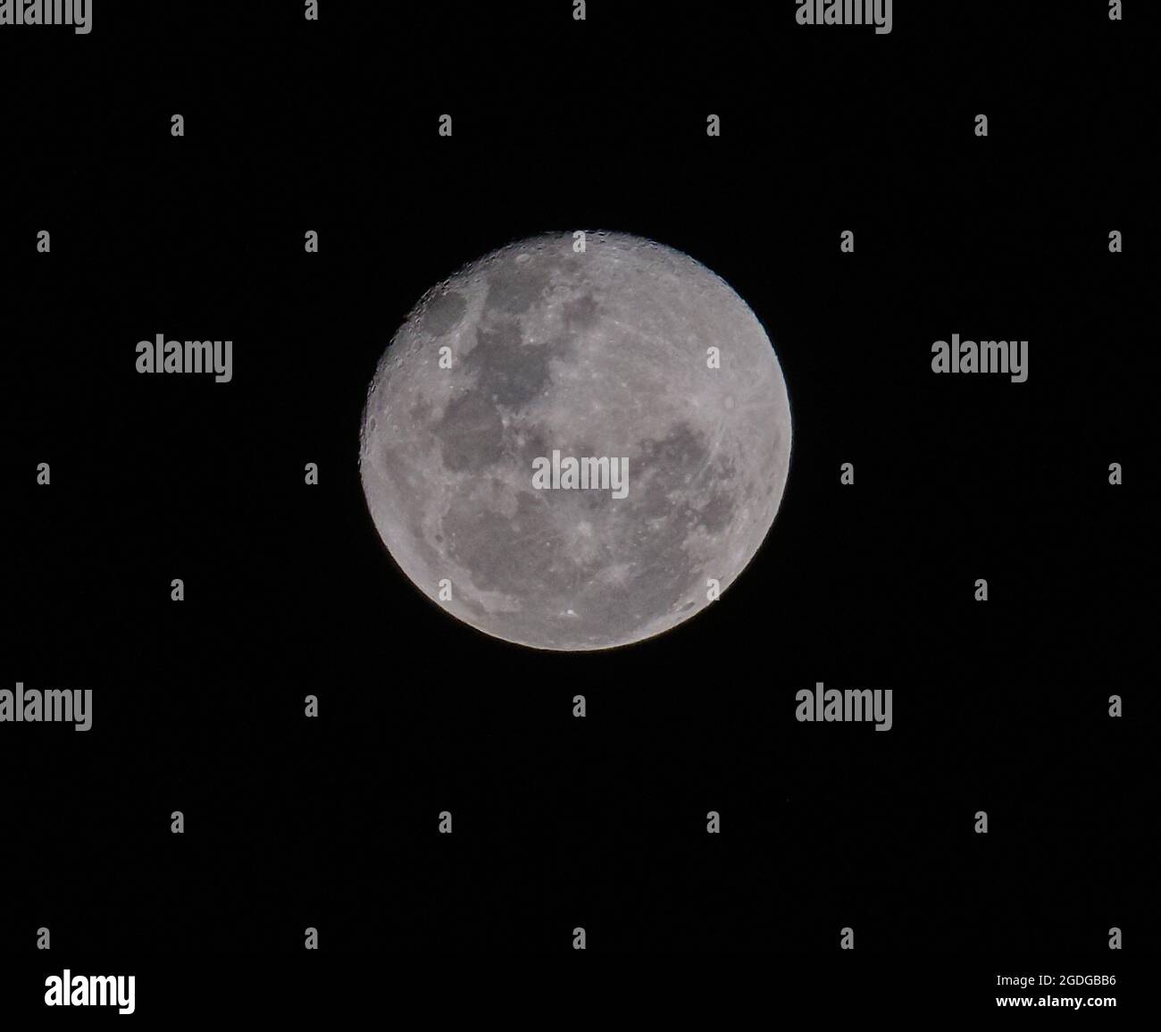 Full moon isolated in black background Stock Photo - Alamy