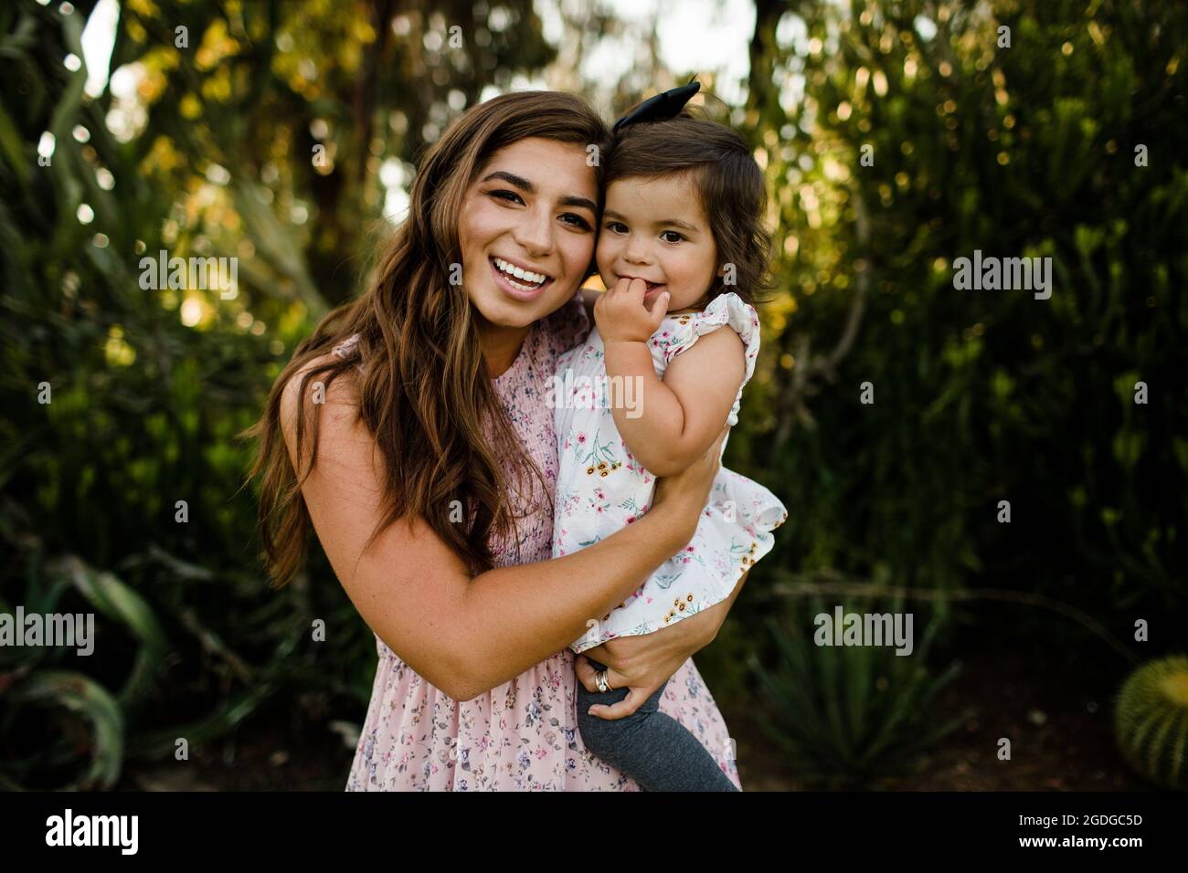 Mom & One Year Old Daughter Smiling for Camera in
