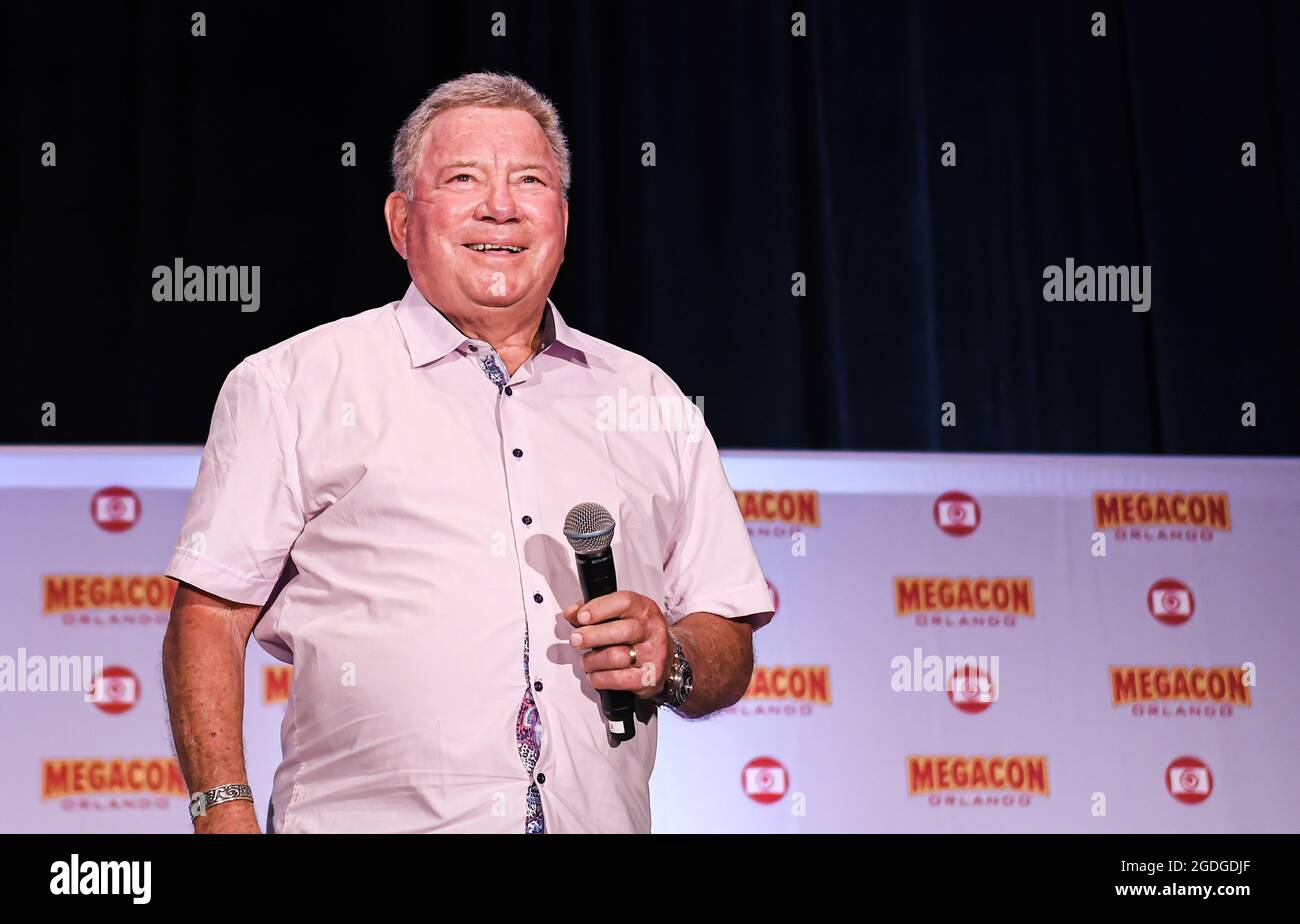 Orlando, United States. 12th Aug, 2021. Actor William Shatner, best known for his portrayal of Captain James T. Kirk of the USS Enterprise in the Star Trek television series and movies, speaks at a Q&A session on the opening day of MEGACON at the Orange County Convention Center. The 4-day convention caters to the comic book, sci-fi, anime, fantasy, and gaming communities, and features celebrity appearances. Due to the current spike in COVID-19 cases in Florida, all attendees are required to wear face masks. Credit: SOPA Images Limited/Alamy Live News Stock Photo