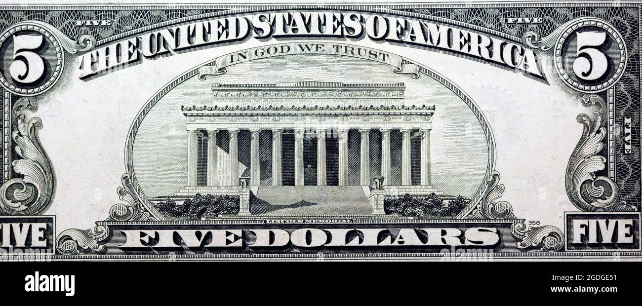 Image of the Lincoln Memorial and the inscription In God we trust, USA. reverse of 5 five dollars US bill series 1988, Old American money, vintage Stock Photo