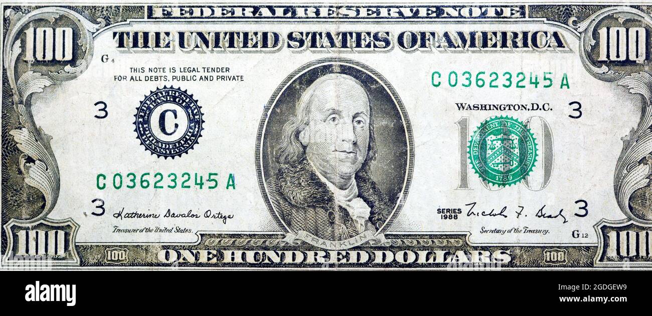 Obverse side of 100 one hundred dollars bill banknote series 1988 with the portrait of president Benjamin Franklin, old American money banknote Stock Photo