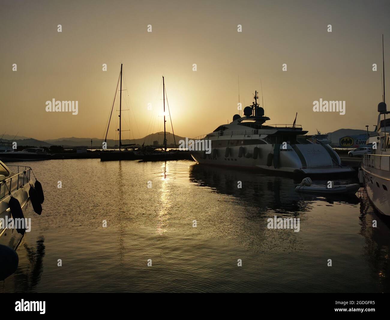 Maxi yacht Lady IN SARDINIA MARINA DI OLBIA PORT at sunset Stock Photo