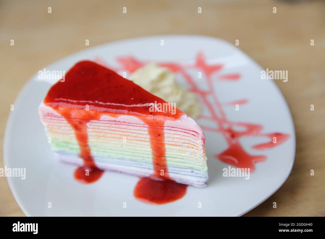 Delicious rainbow cake Stock Photo Alamy