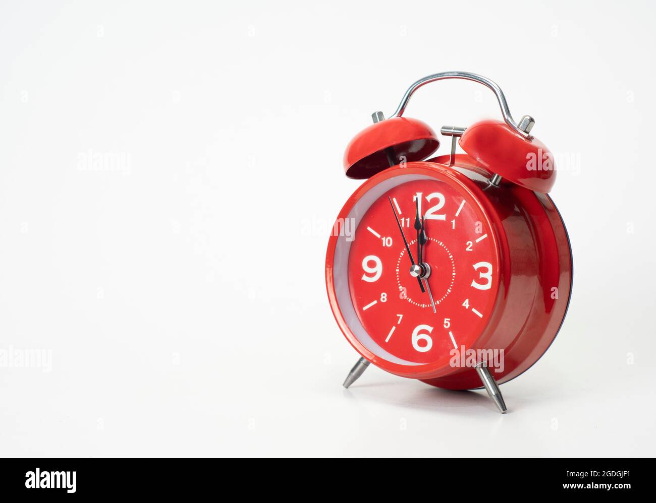 Red alarm clock isolated on white background, Copy space Stock Photo