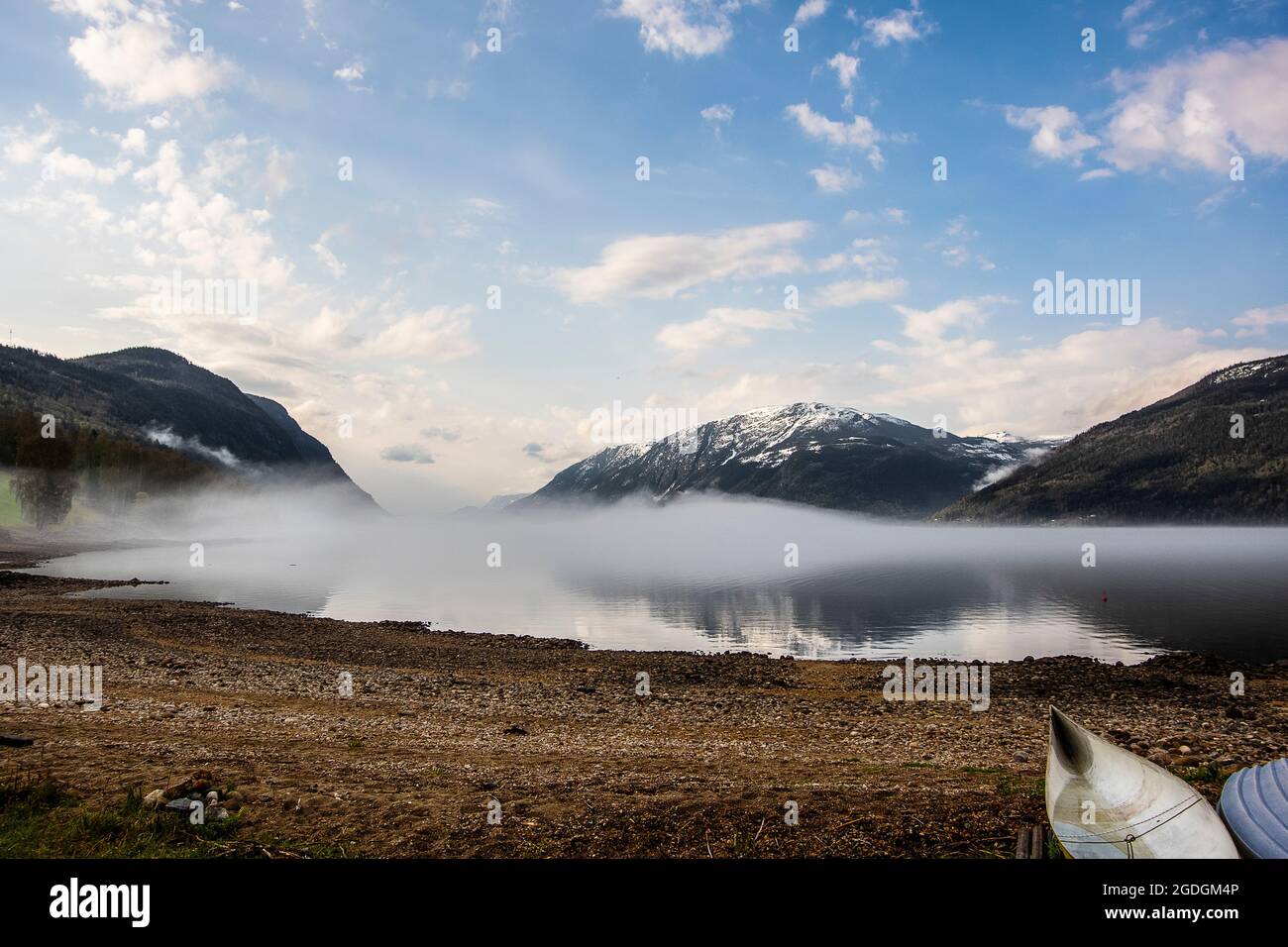 Norwegian landscape with mountains and mist over the Tinnsjo lake Stock ...