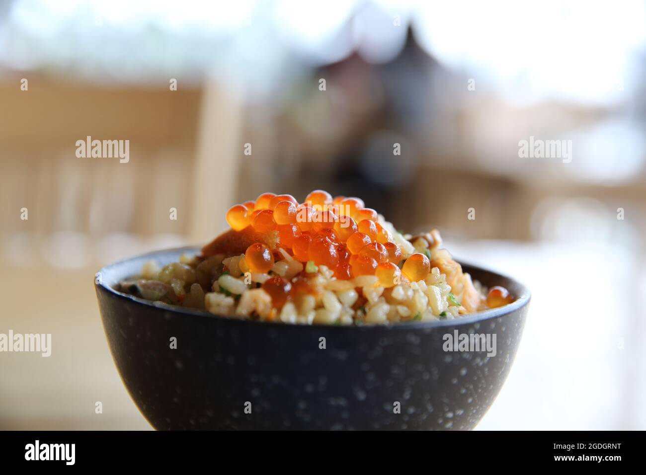 Salmon fish and egg fried rice Stock Photo - Alamy
