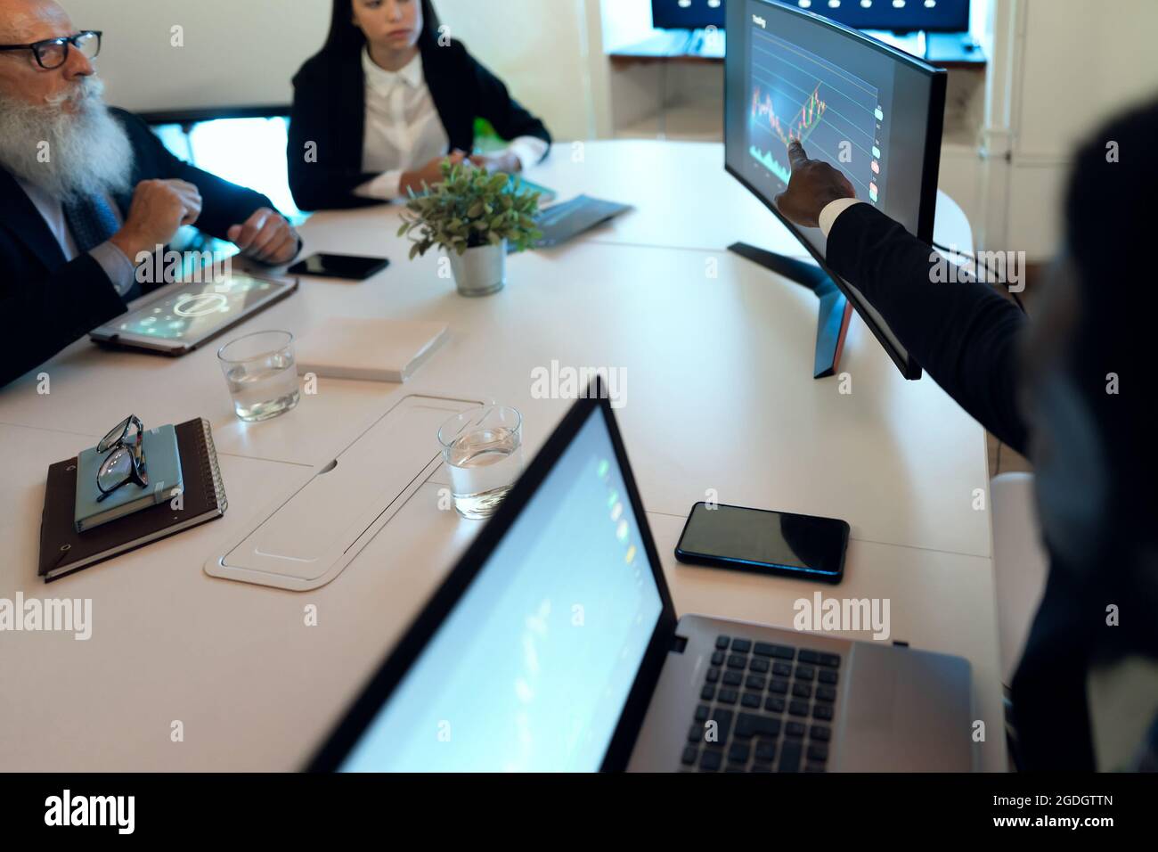Business traders people in meeting room working on crypto currency