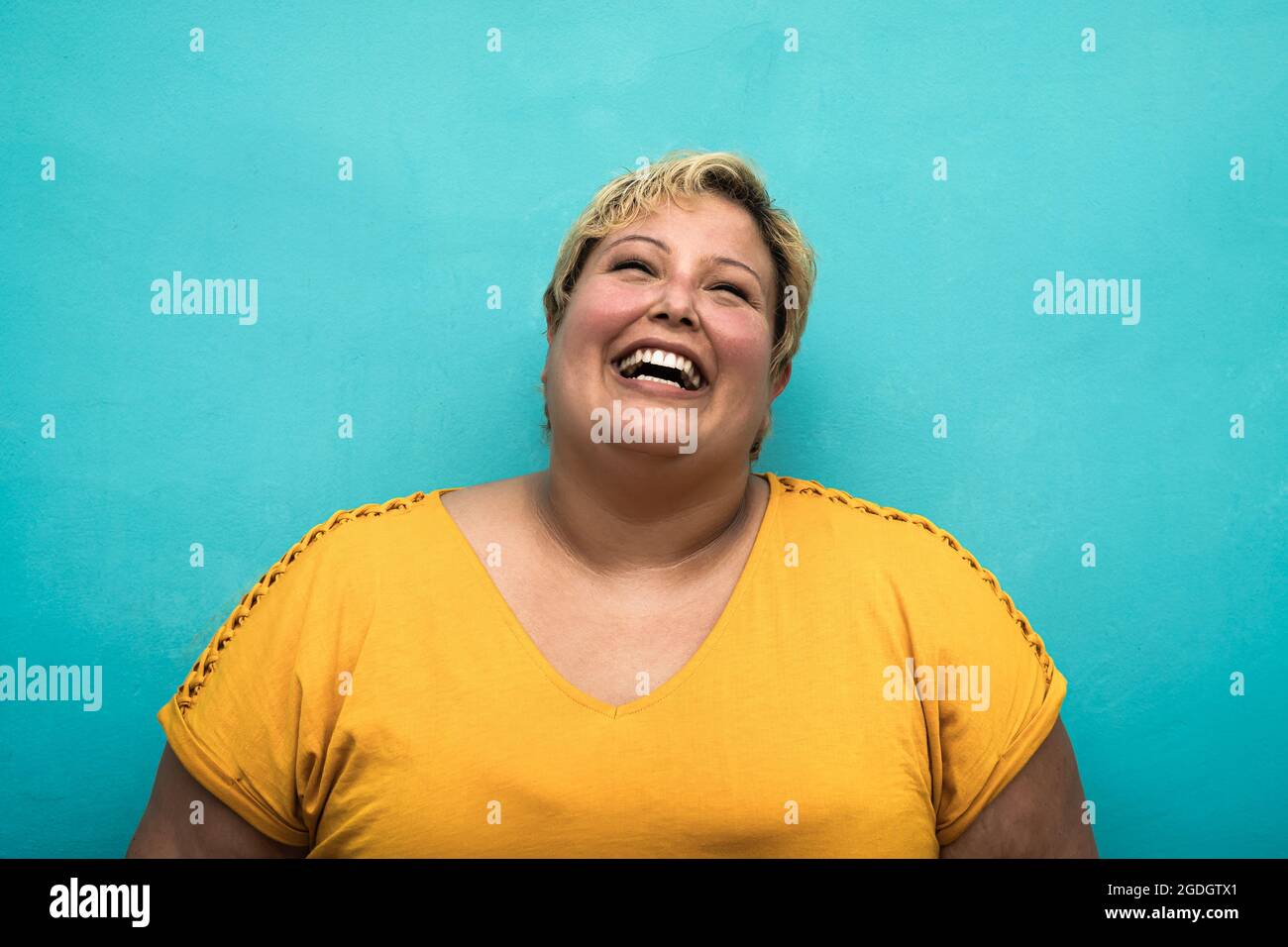 Happy plus size smiling woman portrait Stock Photo