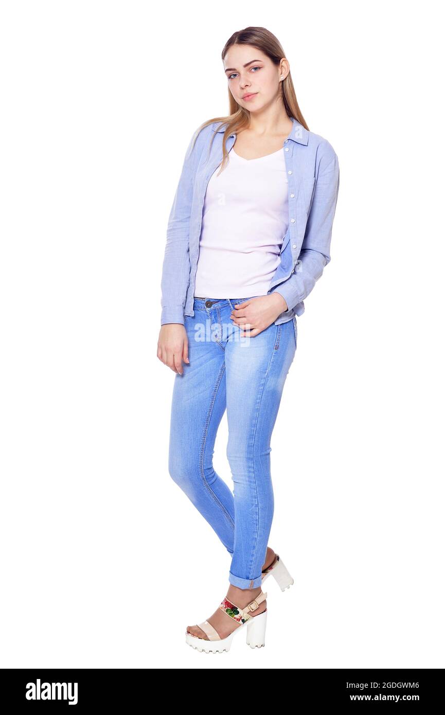 Portrait of beautiful woman in jeans posing Stock Photo - Alamy