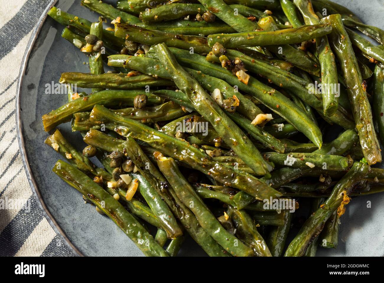 Healthy Homemade Roasted Green Beans with Garlic and Capers Stock Photo