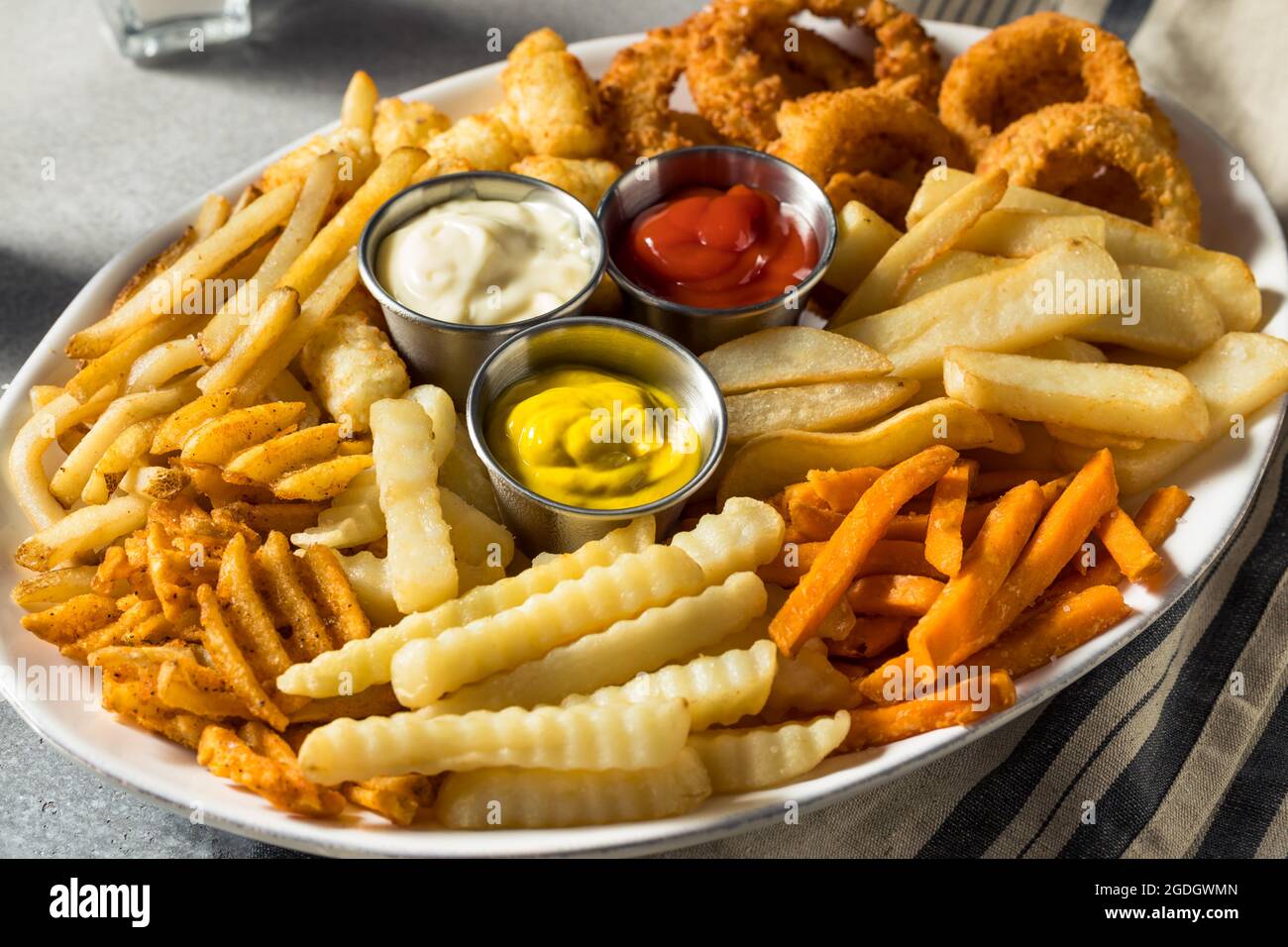 Homemade Crispy Deep Fried French Fry Platter with Dipping Sauces Stock