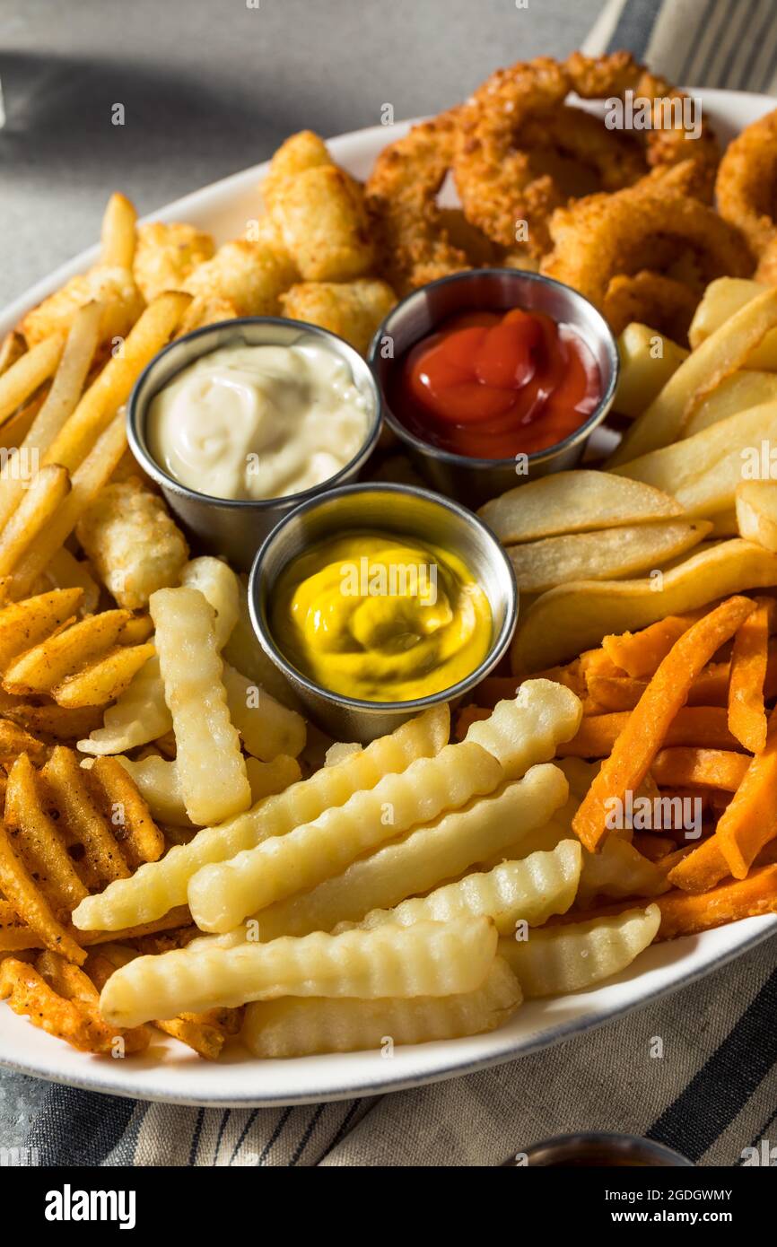 Homemade Crispy Deep Fried French Fry Platter with Dipping Sauces Stock