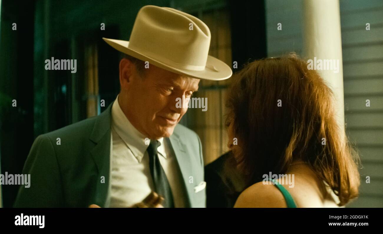 USA. Anna Friel and Kelsey Grammer in a scene from (C)Gravitas Ventures new  film: Charming the Hearts of Men (2021). Plot: A romantic drama set during  the politically charged early 60s where