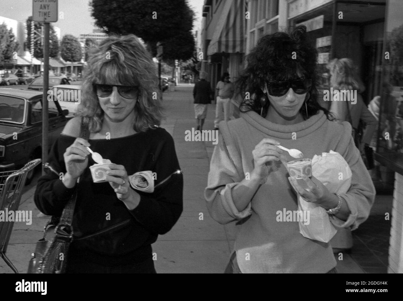 Cher and sister Georganne LaPiere exiting The Frozen Yogurt Company in California. Circa 1980's Credit: Ralph Dominguez/MediaPunch Stock Photo