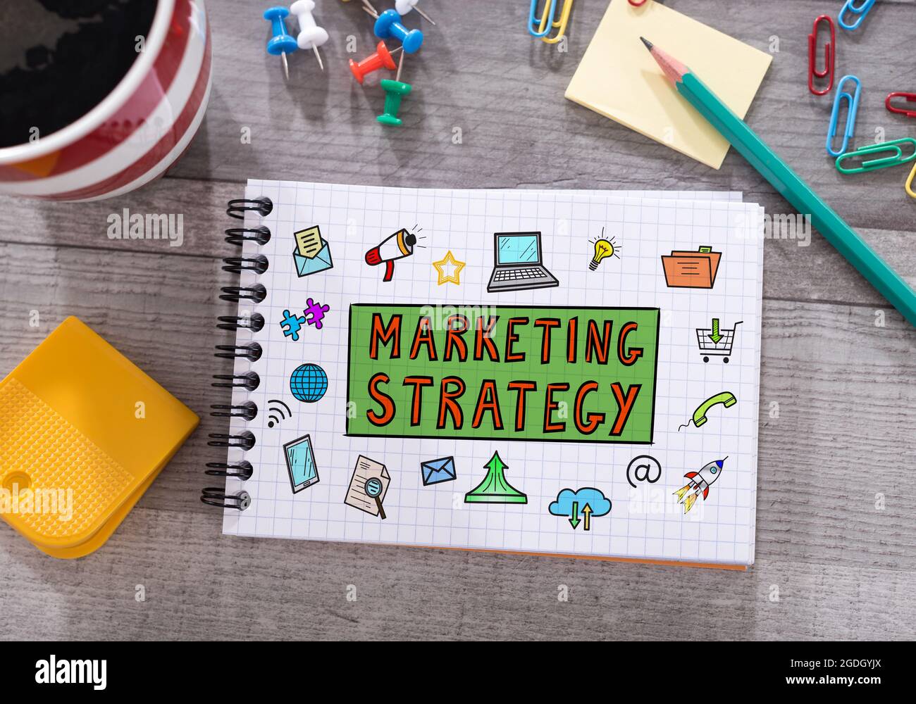 Marketing strategy concept drawn on a notepad placed on a desk Stock ...