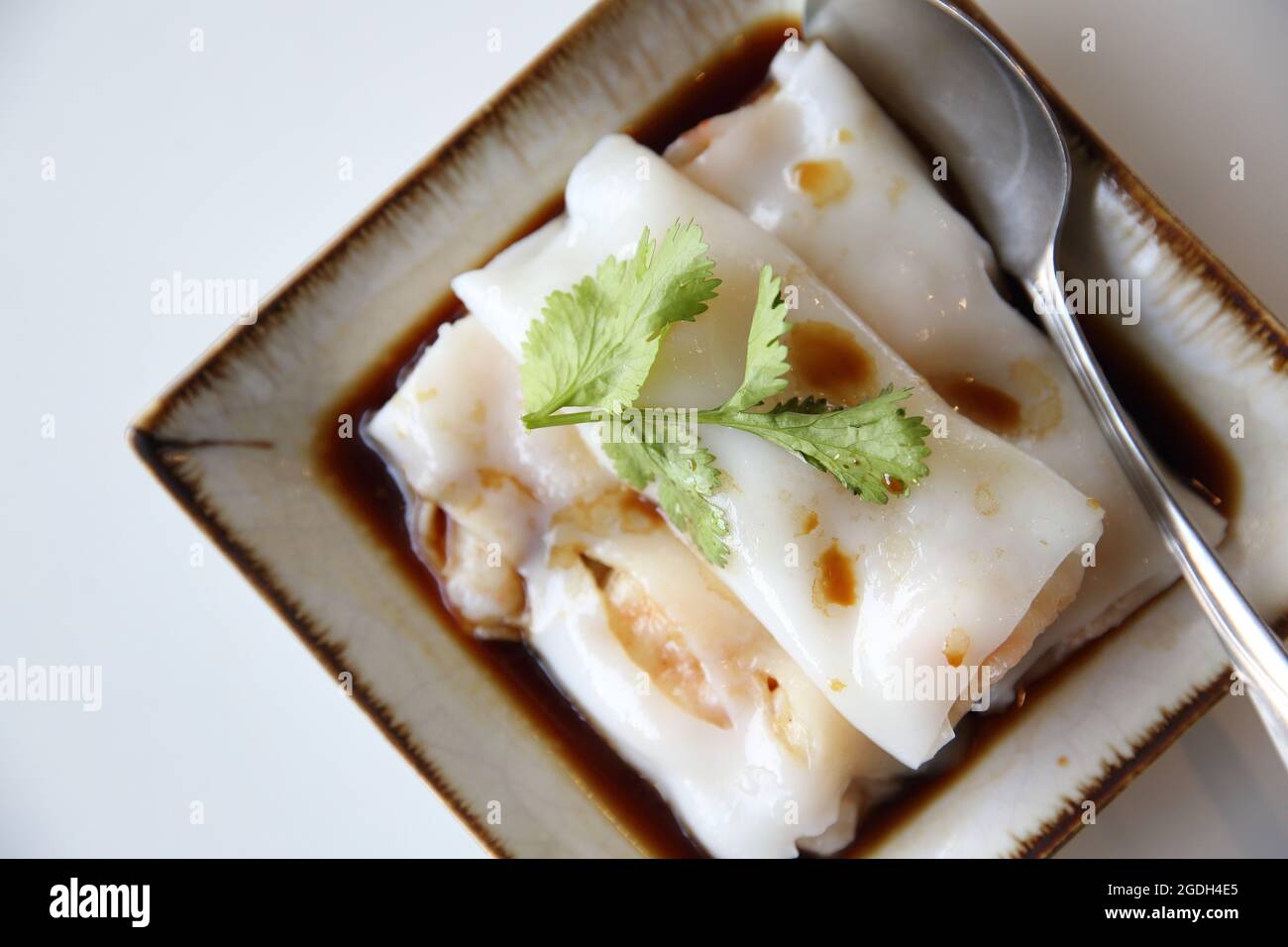 Chinese shrimp spring rolls isolated in white background Stock Photo
