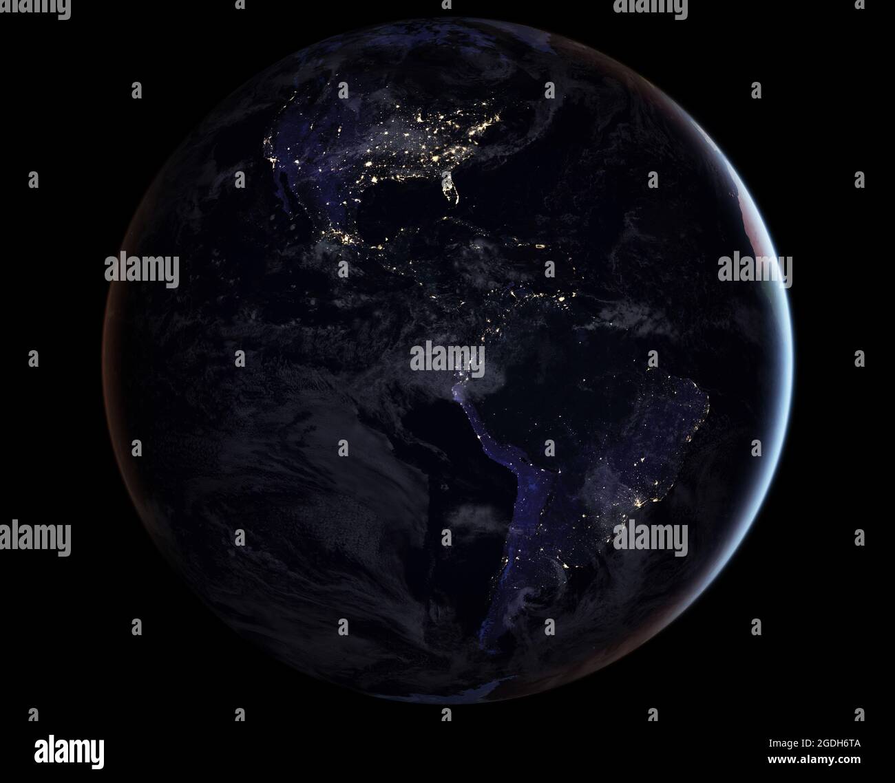 The earth at night as seen from spce, with the lights of towns and cities visible. Stock Photo