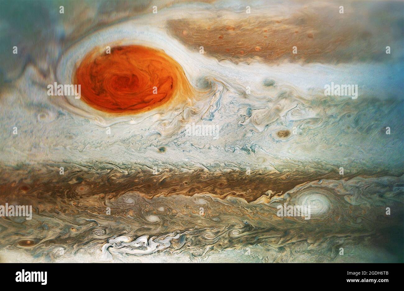 A dramatic close up of the giant Red Spot on Jupiter as seen by NASA's Juno spacecraft in 2018. The image is a composite of three images taken from between 15400 miles and 30600 miles altitude (this is why the top left of the image is blurred). Stock Photo