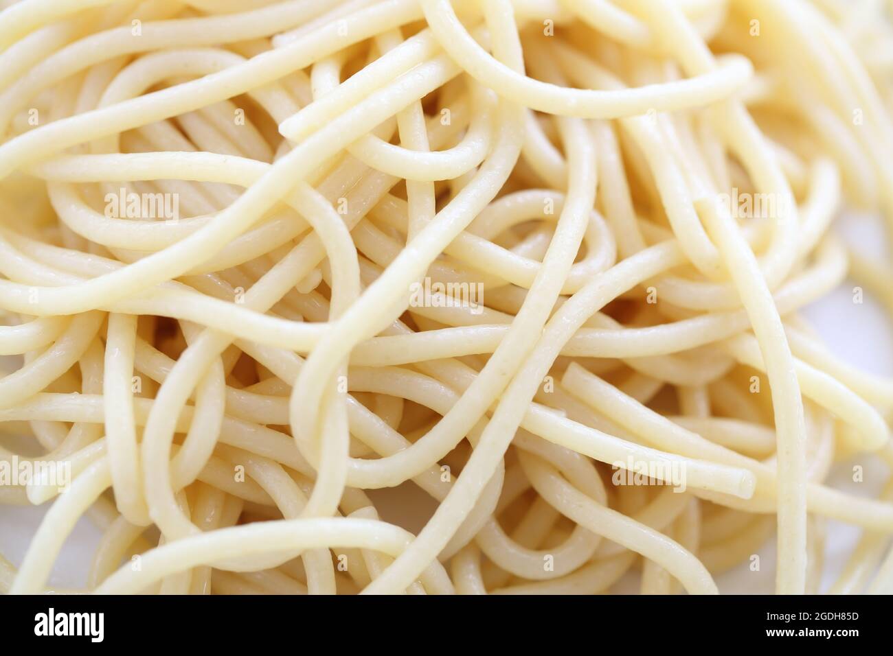 Spaghetti noodle isolated in white background Stock Photo - Alamy
