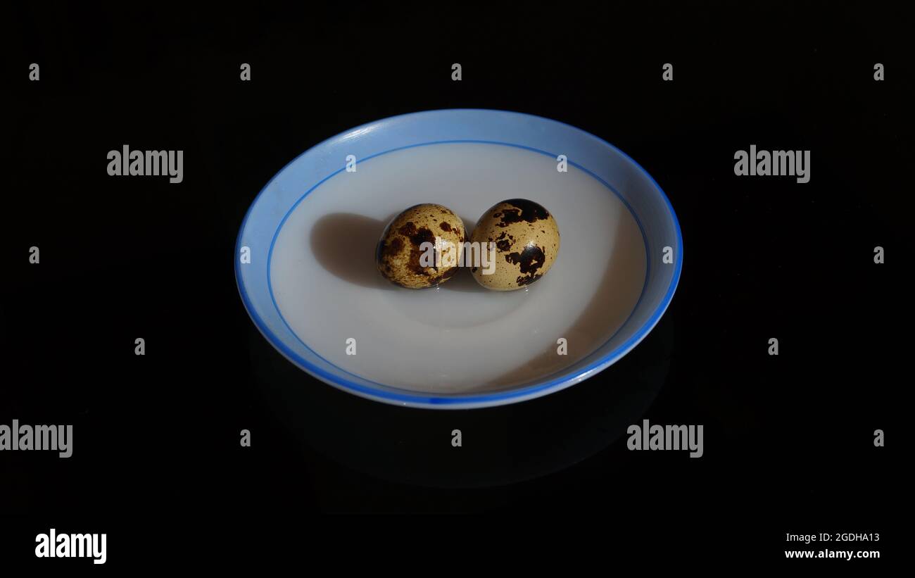 Boiled quail eggs on the plate Stock Photo