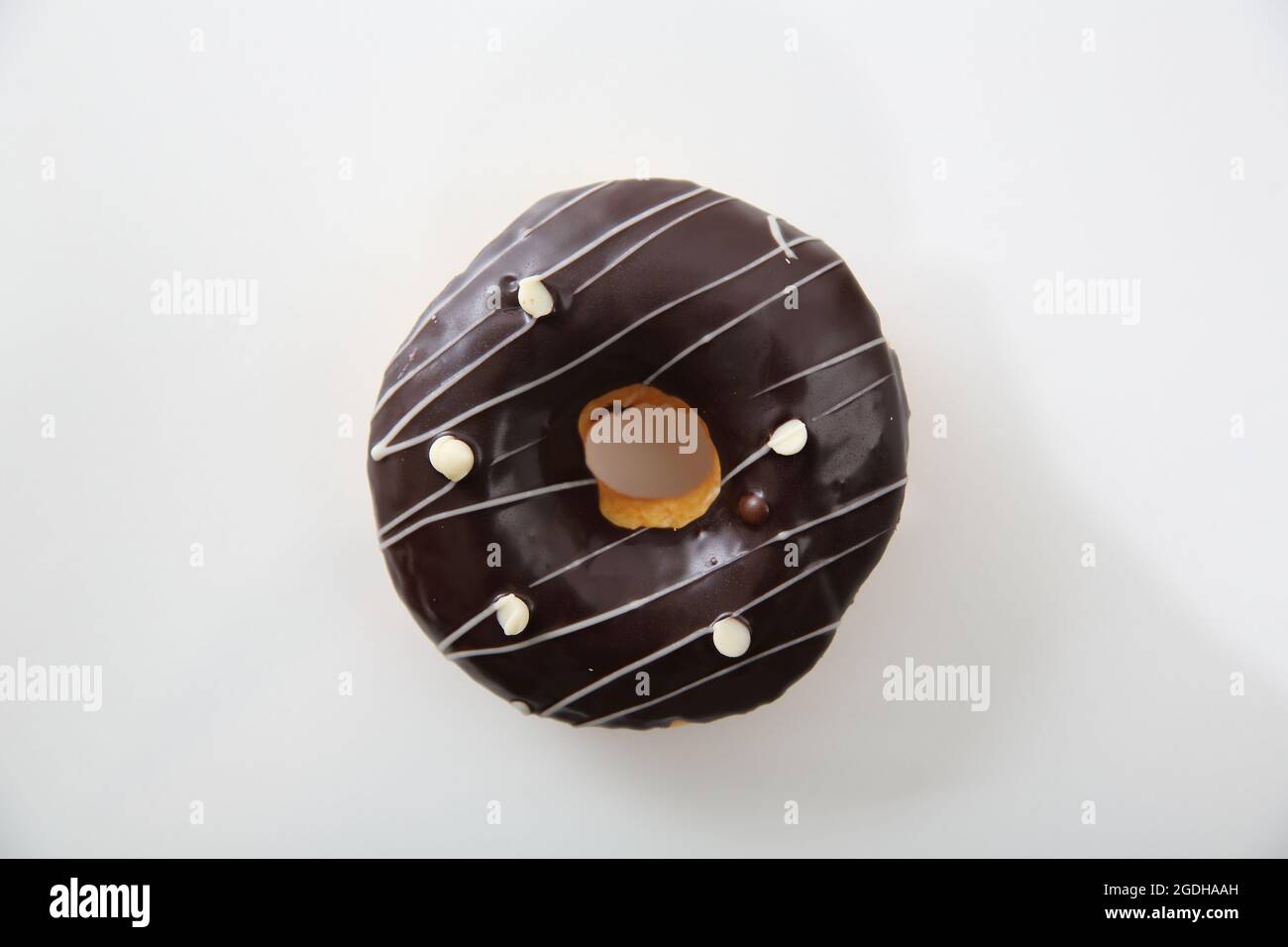 Chocolate donut isolated in white background Stock Photo - Alamy