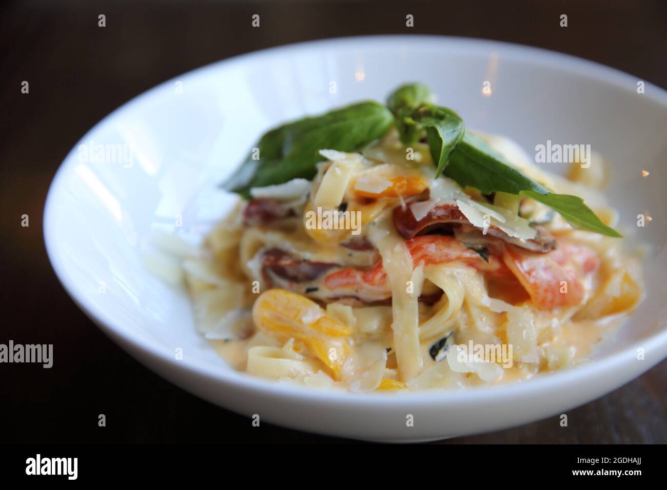 Chorizo sausage spaghetti fettuccine on wood background Stock Photo Alamy