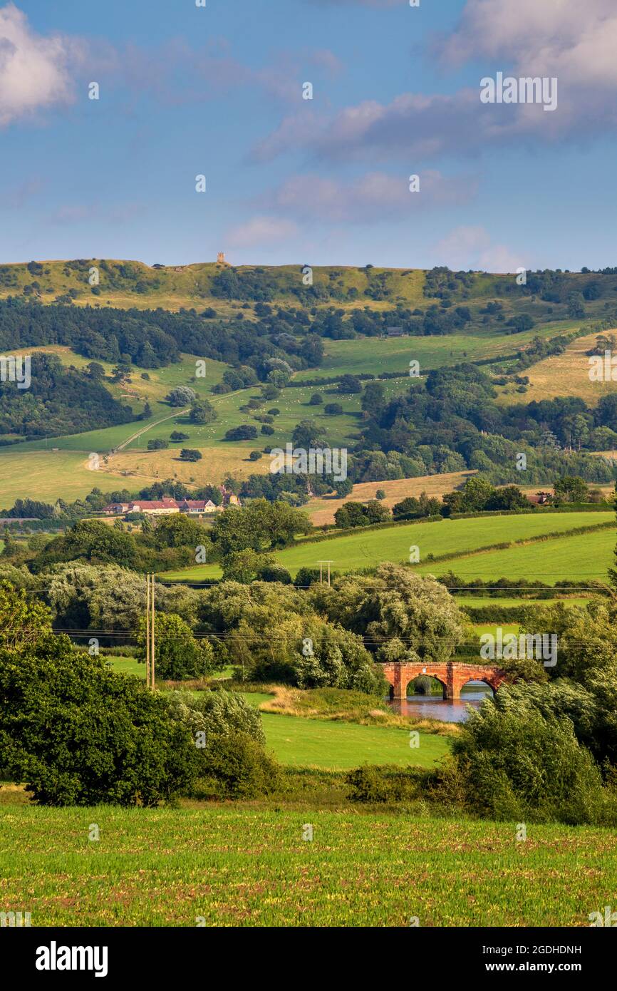 A view of Bredon HIll with Parson's Folly and Eckington Bridge, Cotswolds AONB, Worcestershire, England Stock Photo